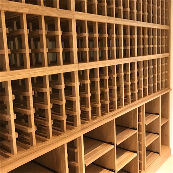 Wine wall made from solid oak in a residential property in Truro, Cornwall