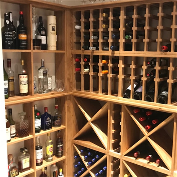 Compact wine room in Warwickshire storing standard bottles, spirits, glassware + more!